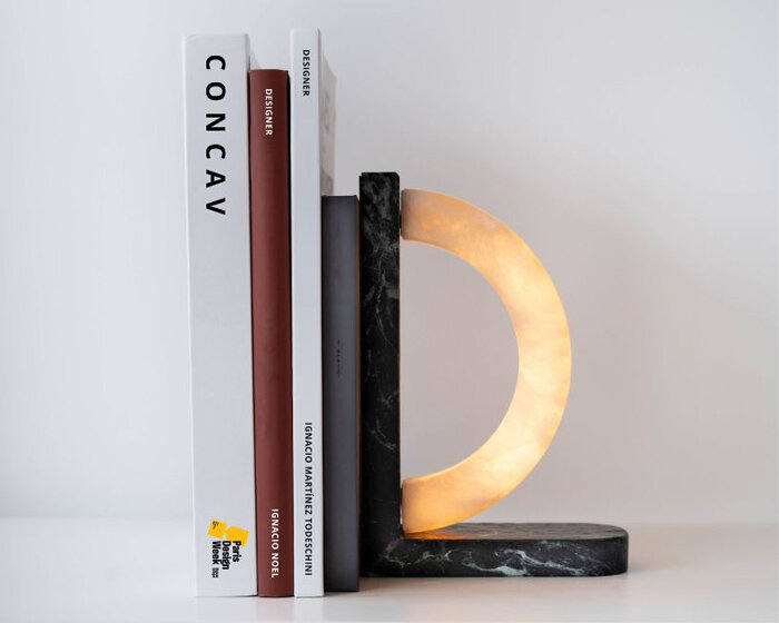 hollowed quartzite and steel form concav book, a magnetic bookend luminaire
