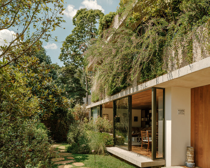 continuous vertical gardens and layered planters wrap 111 house in são paulo