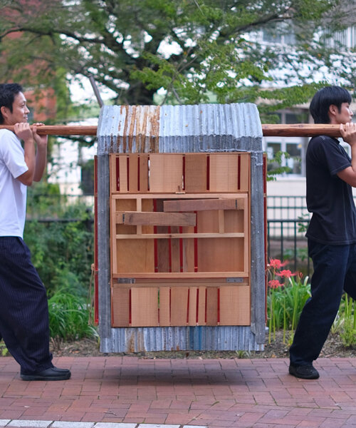 built from upcycled timber and iron, portable micro-barn wanders through japan
