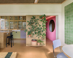 stepped timber platforms and operable textiles shape circular düsseldorf home by urselmann interior