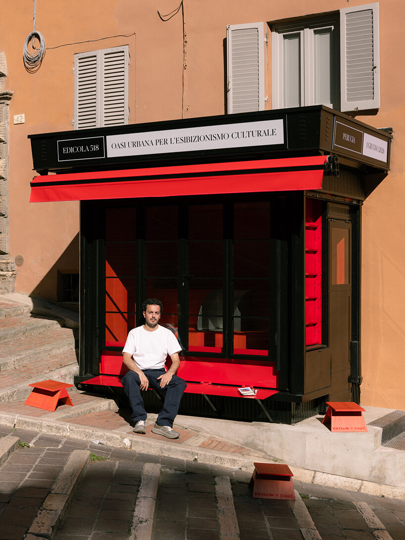 historic perugia newsstand reconfigures into stepped red oak mini reading kiosk - 11
