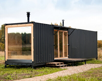 repurposed shipping container becomes 24-sqm birch plywood micro-cabin