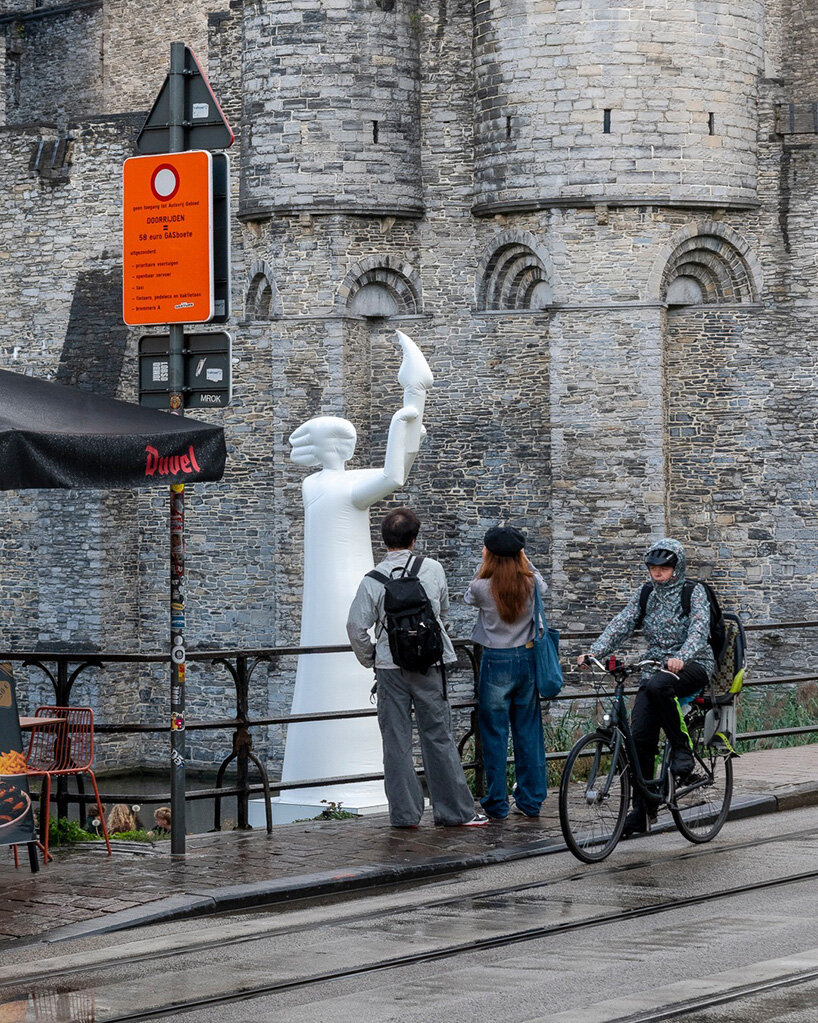 the figure’s simplified features and inflated surface are visible up close