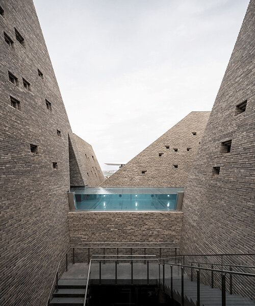 kengo kuma's brick towers frame open-air pools at copenhagen's upcoming bathhouse