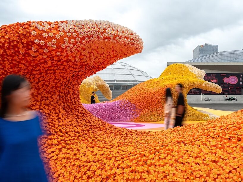 380,000 LEGO flowers transform shanghai's concrete oil tank into botanical landscape - 3