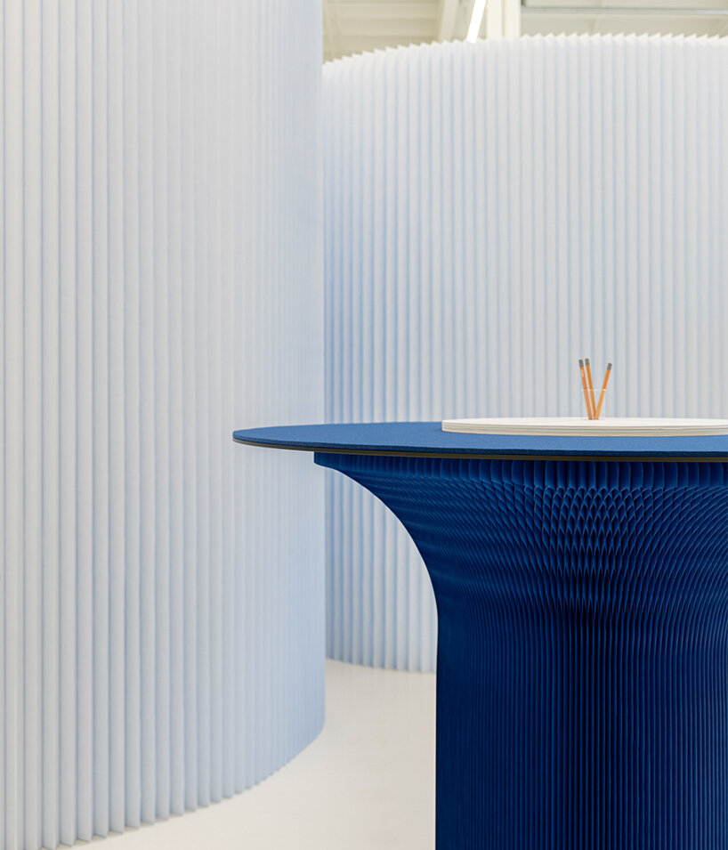 softwall by molo translates nature-inspired blues into a flexible, light-responsive paper partition system - 4