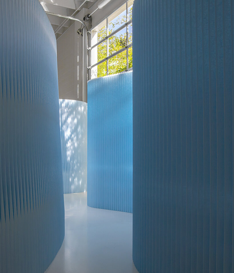 softwall by molo translates nature-inspired blues into a flexible, light-responsive paper partition system - 5