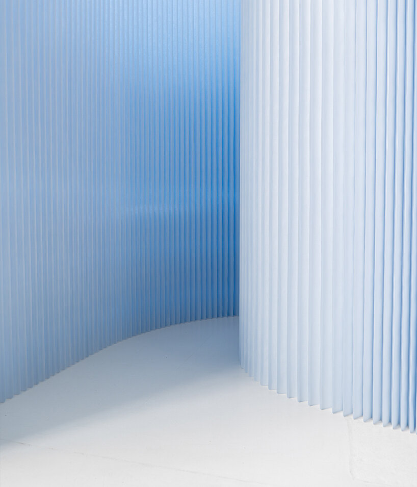 softwall by molo translates nature-inspired blues into a flexible, light-responsive paper partition system - 7