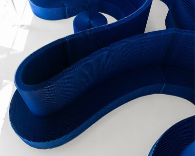 softwall by molo translates nature-inspired blues into a flexible, light-responsive paper partition system