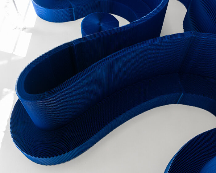 softwall by molo translates nature-inspired blues into a flexible, light-responsive paper partition system