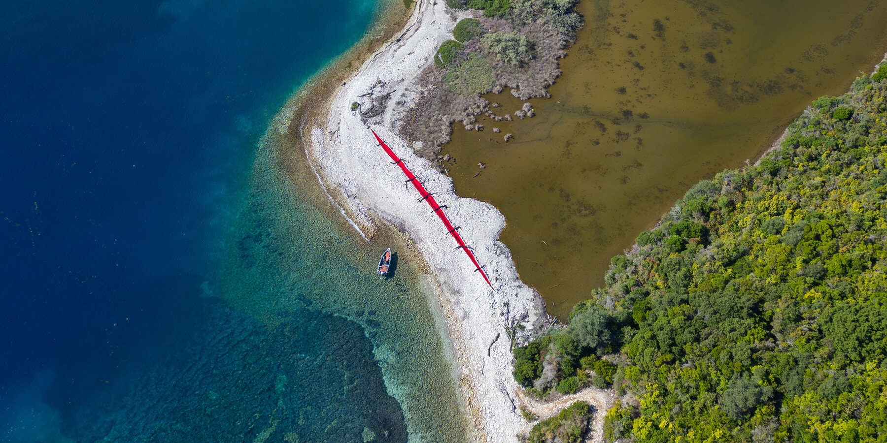 red-wound-black-stitches-bulldozer-scar-land-art-the-krank-corfu-designboom-1800-2