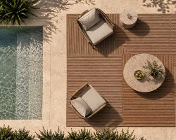 rima dain frames exterior living zones with custom architectural outdoor rugs