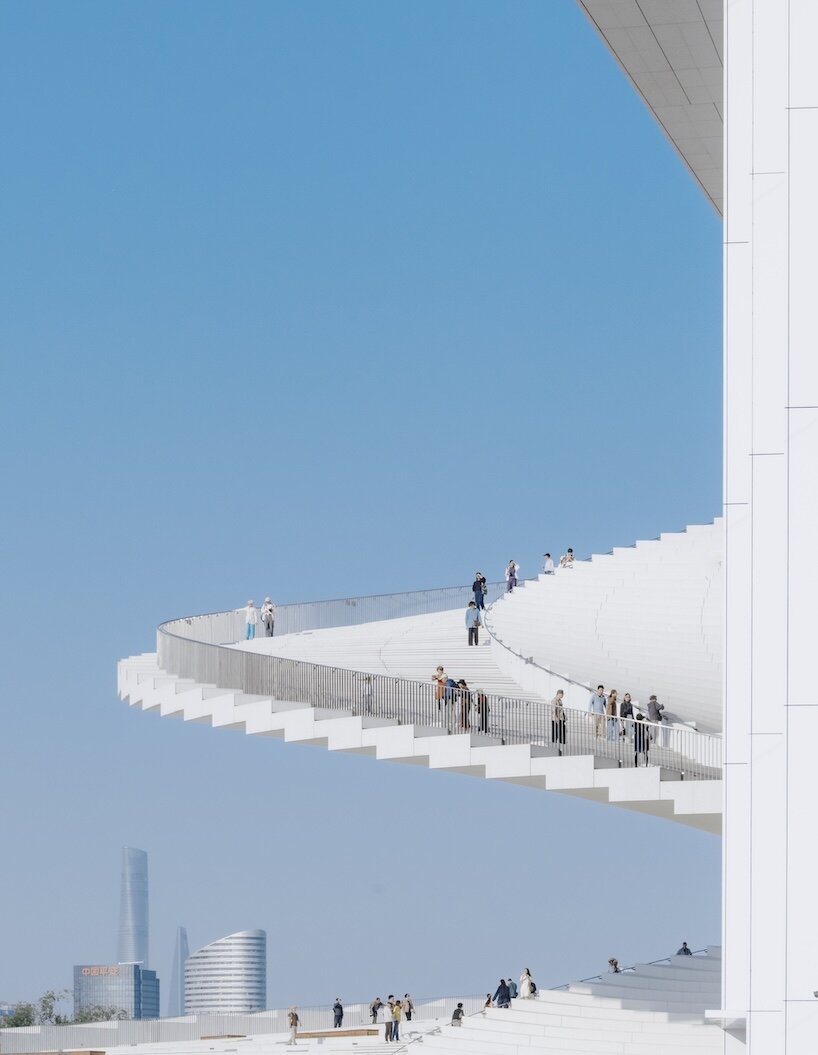 snøhetta unveils completed shanghai grand opera house with spiraling public rooftop - 4