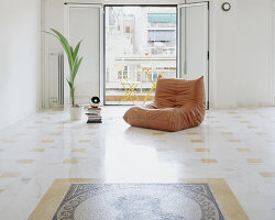 bacchus floor mosaic inspires yellow terrazzo and marble apartment renovation in athens